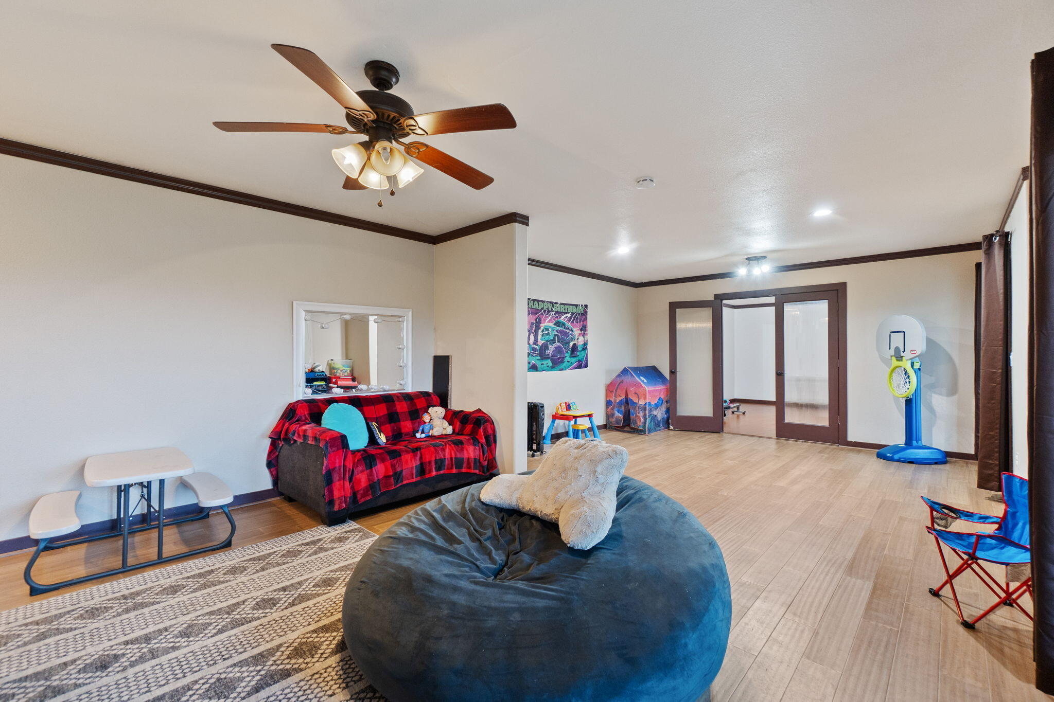 3360 Stanford Drive Redding, CA 96003 - Photo 34 of 56 a living room with furniture ceiling fan and a wooden floor