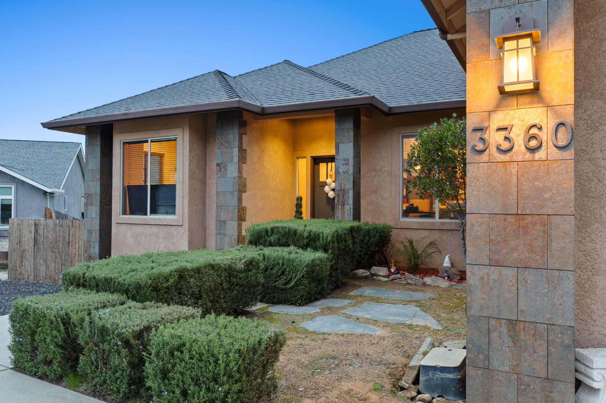 3360 Stanford Drive Redding, CA 96003 - Photo 4 of 56 a front view of a house with garden