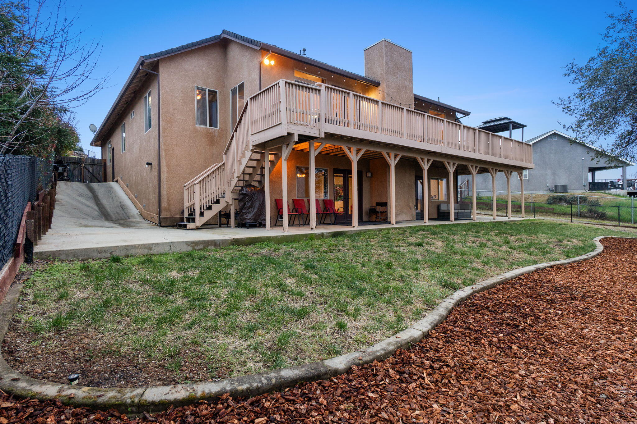 3360 Stanford Drive Redding, CA 96003 - Photo 42 of 56 a front view of a house with garden