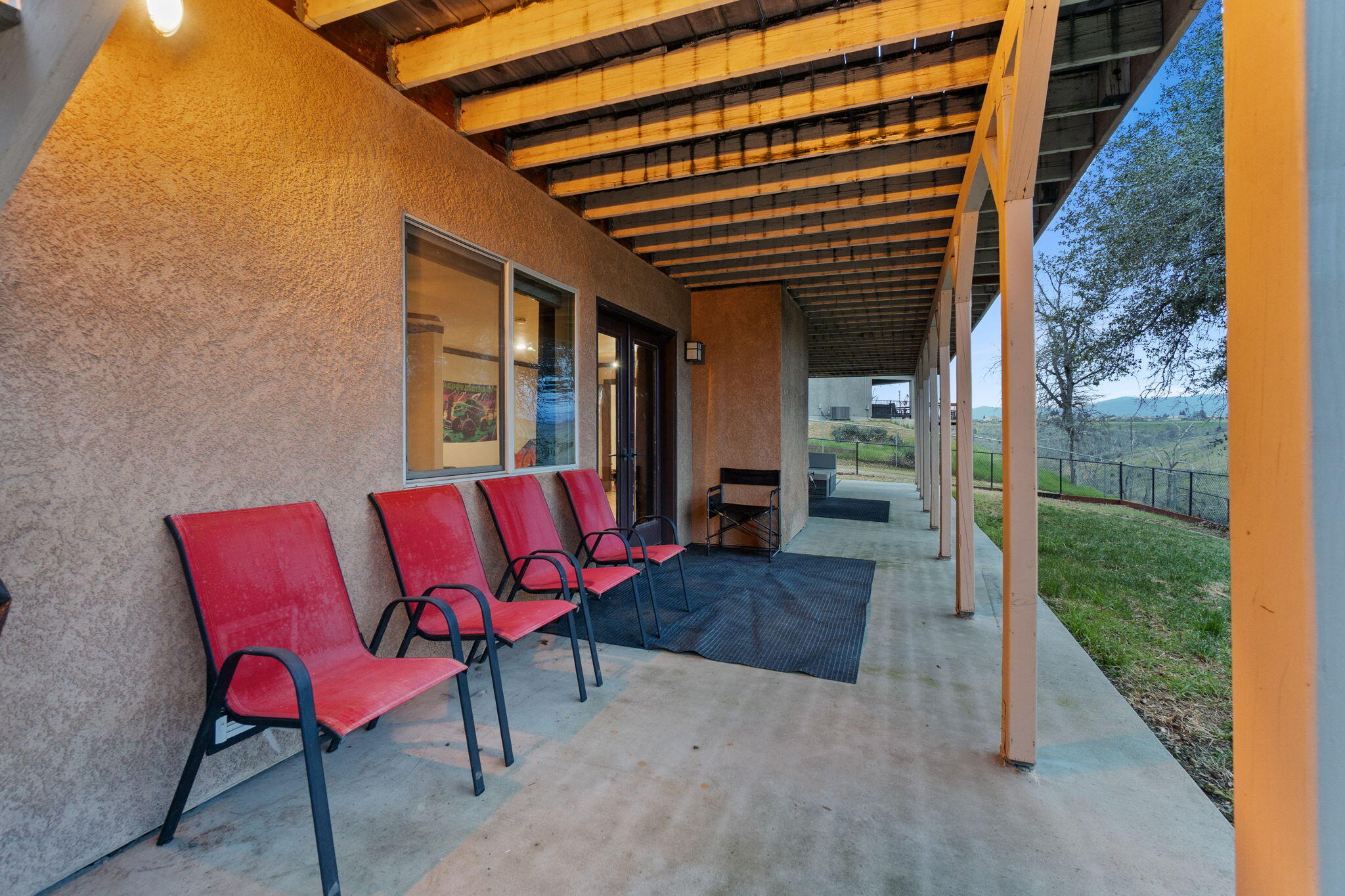 3360 Stanford Drive Redding, CA 96003 - Photo 50 of 56 a view of a porch with furniture and yard