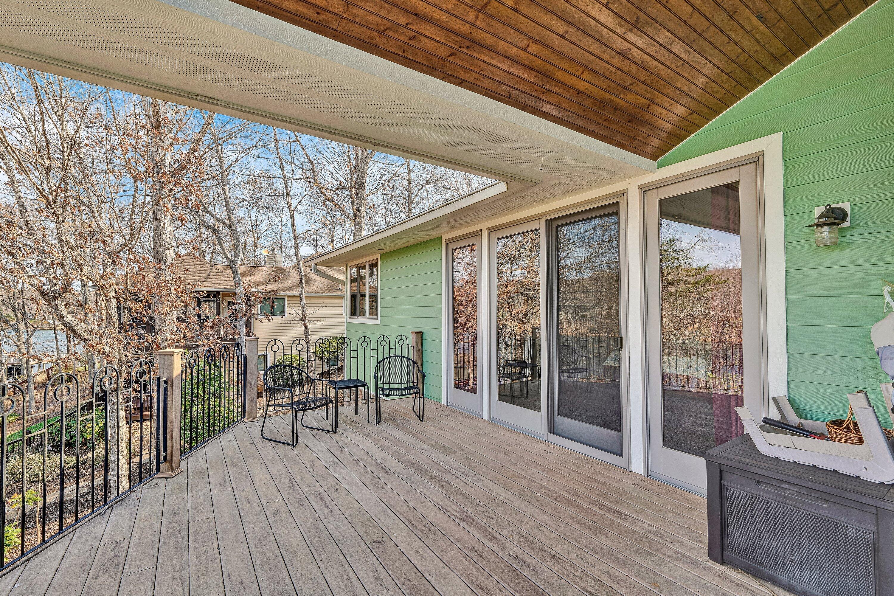 23 Waterpoint Court Moneta, VA 24121 - Photo 11 of 38 a deck view with a seating space