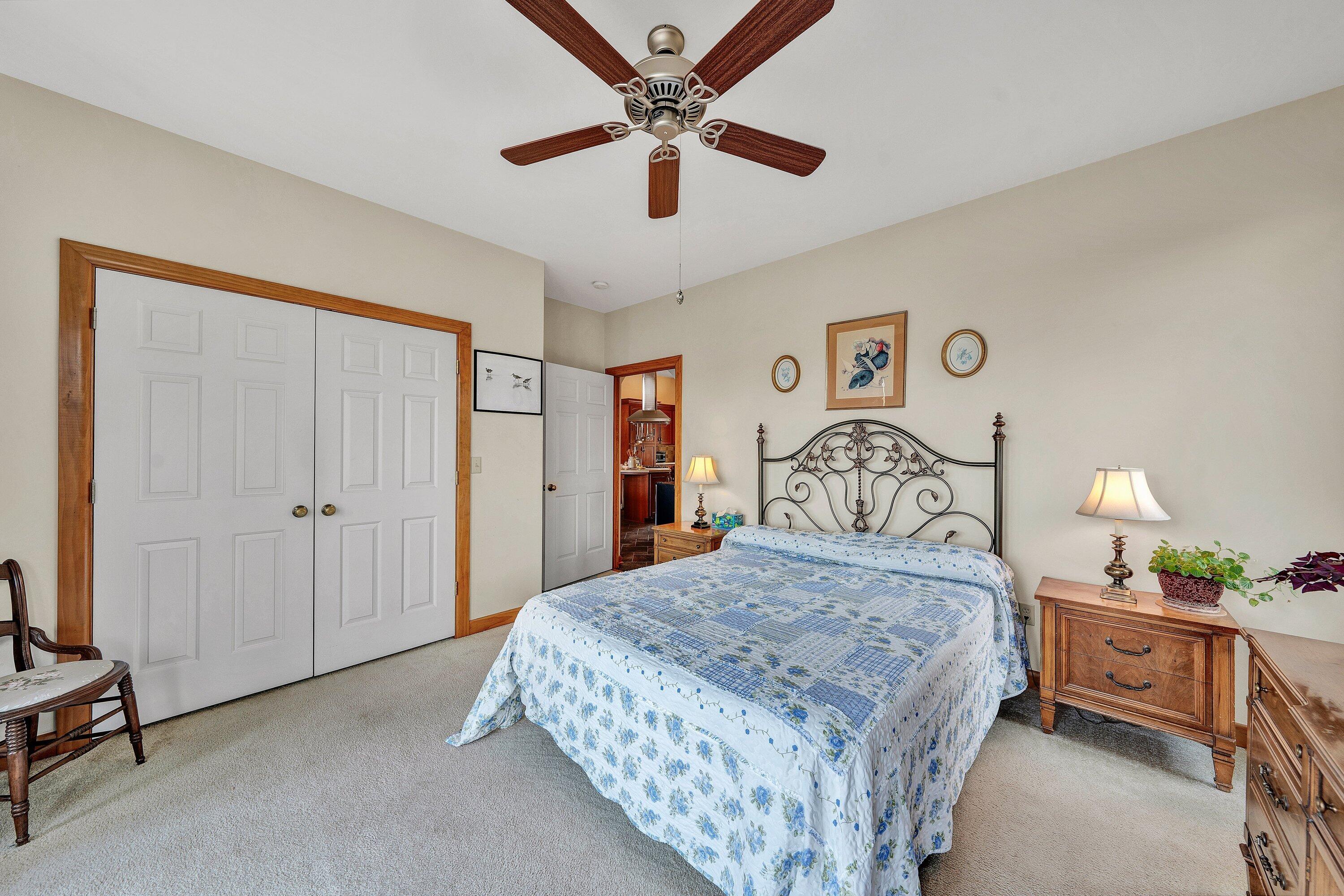 23 Waterpoint Court Moneta, VA 24121 - Photo 16 of 38 a bedroom with a bed and a dresser in it