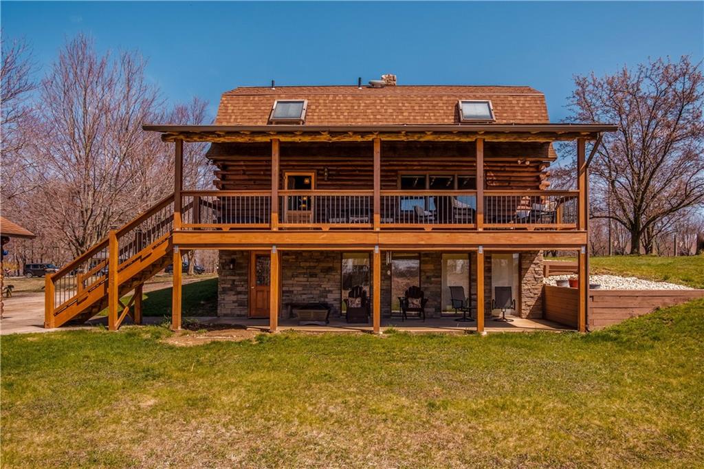 411 Rohrmann Road Darlington, PA 16115 - Photo 22 of 25 front view of a house with a yard