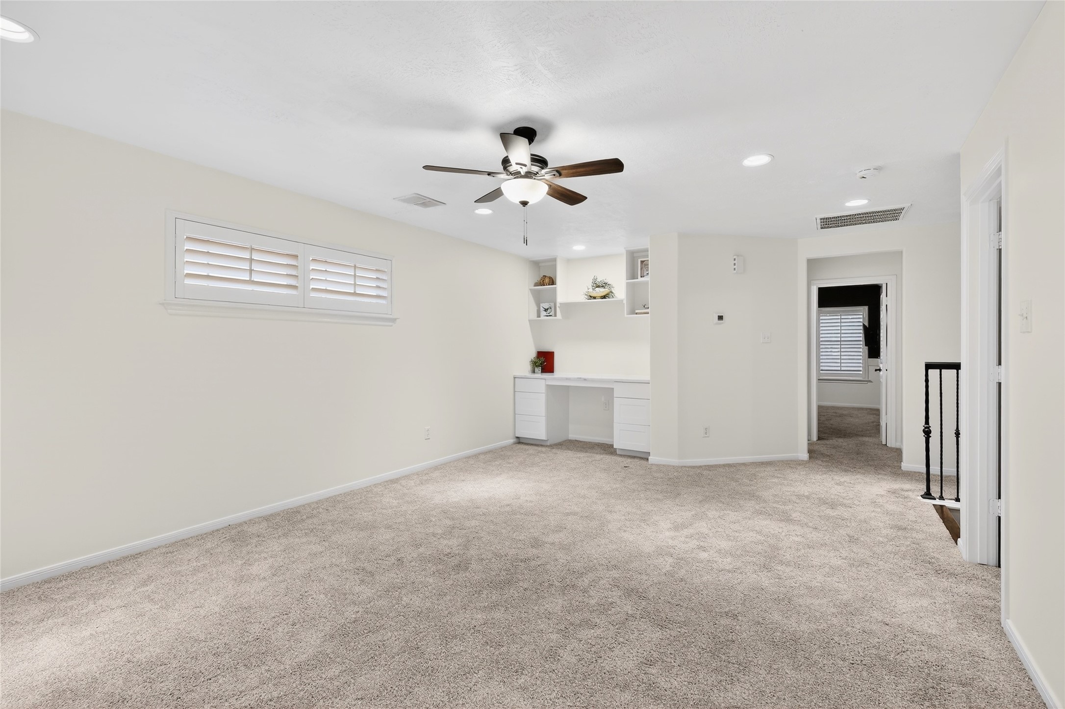 46 New Dawn Place Conroe, TX 77385 - Photo 24 of 39 Game Room/ Flex Space with Built-In Desk