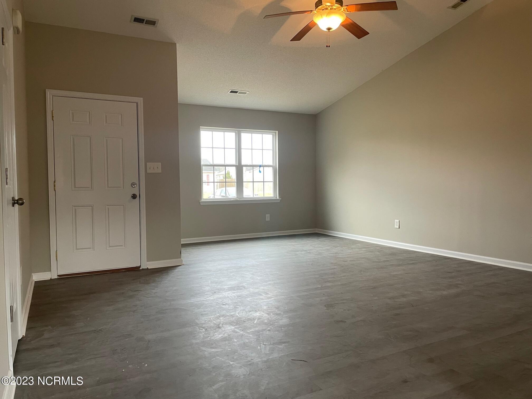 207 Hackney Ridge Lane Jacksonville, NC 28540 - Photo 2 of 7 Living Room 1