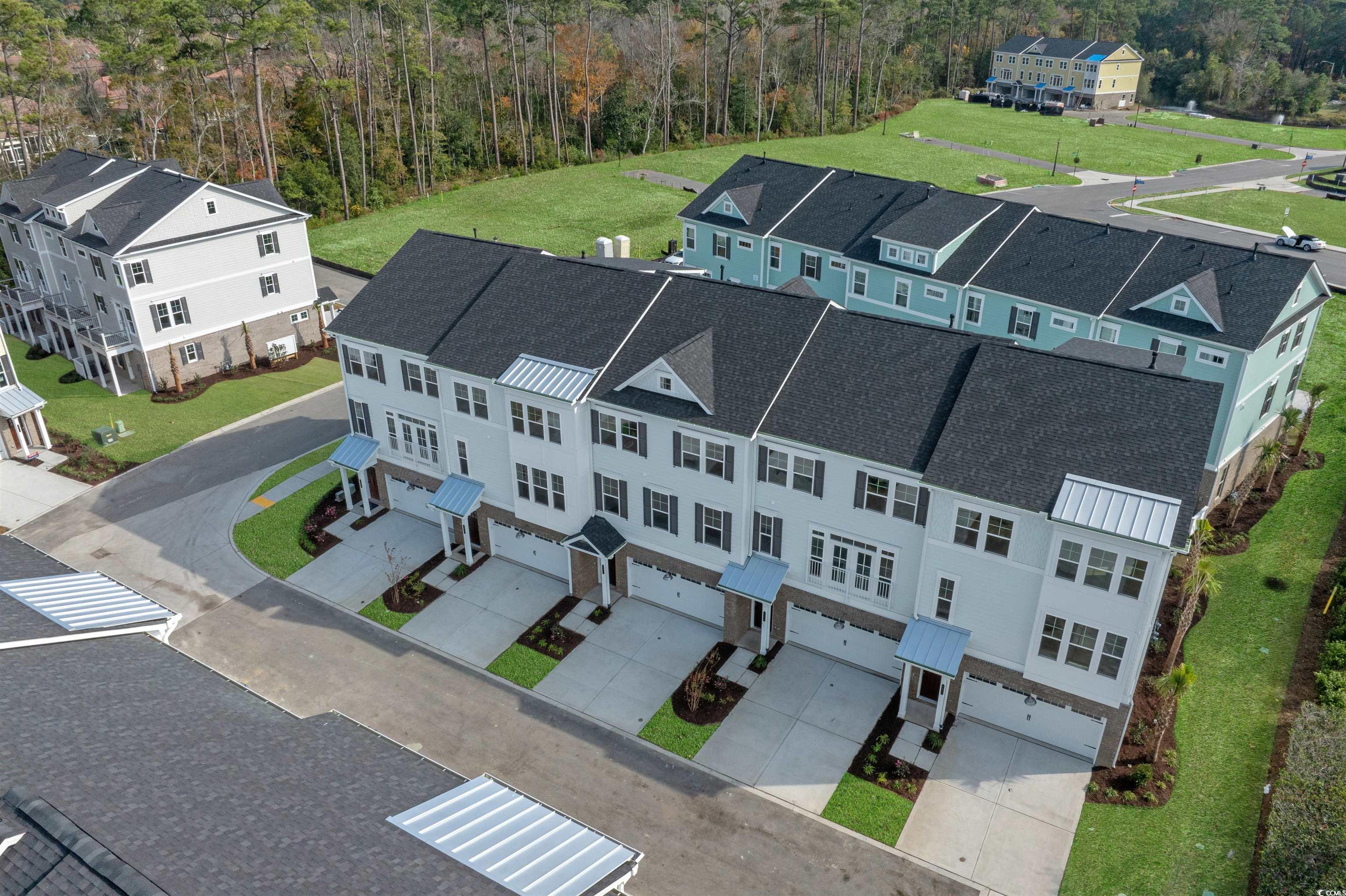 8472 Duke Place, Unit 30 Myrtle Beach, SC 29572 - Photo 2 of 40 Bird's eye view of a heavily wooded area