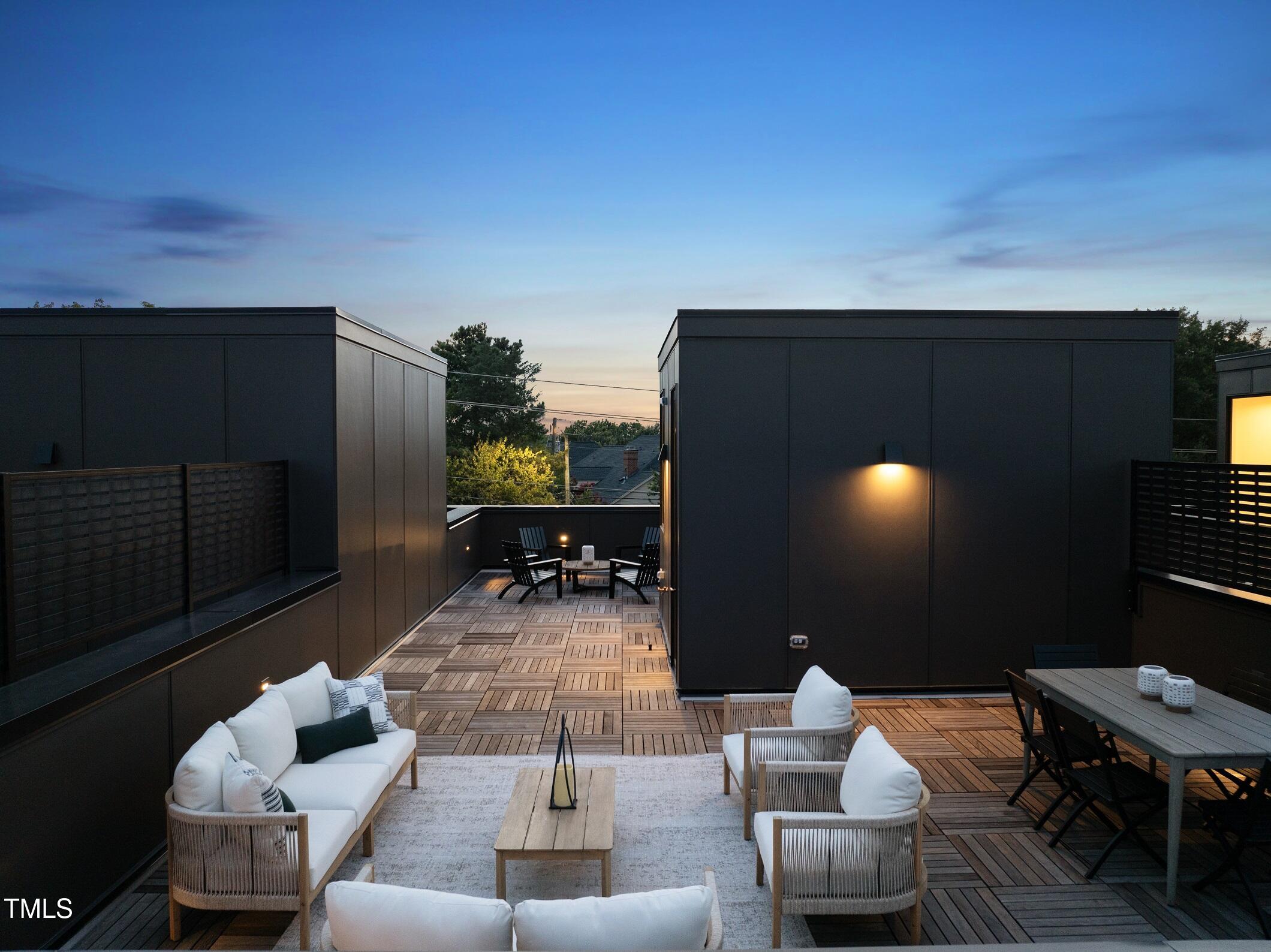 1303 Chamblee Hill Raleigh, NC 27608 - Photo 2 of 49 a outdoor living space with furniture and a flat screen tv