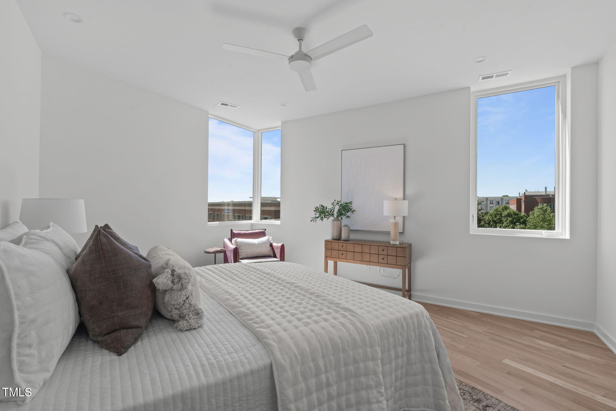 1303 Chamblee Hill Raleigh, NC 27608 - Photo 21 of 49 a bedroom with a bed and a window