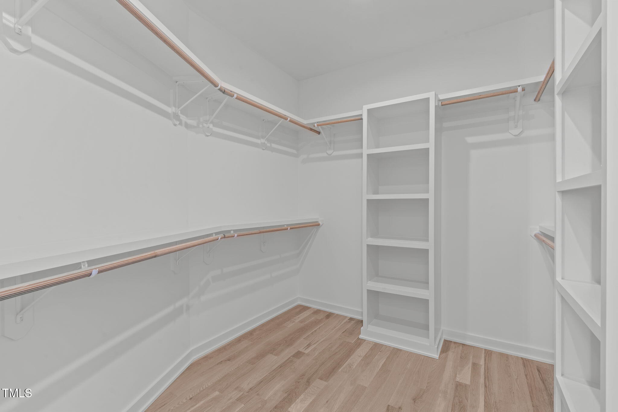 1303 Chamblee Hill Raleigh, NC 27608 - Photo 24 of 49 a view of an empty walk in closet