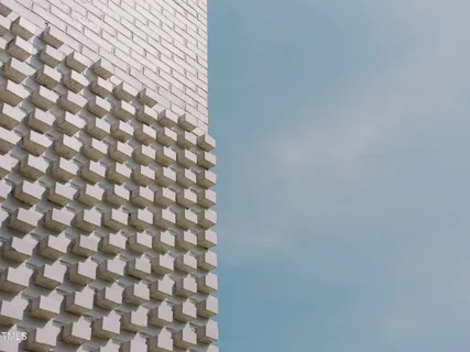 a view of a white building among the street