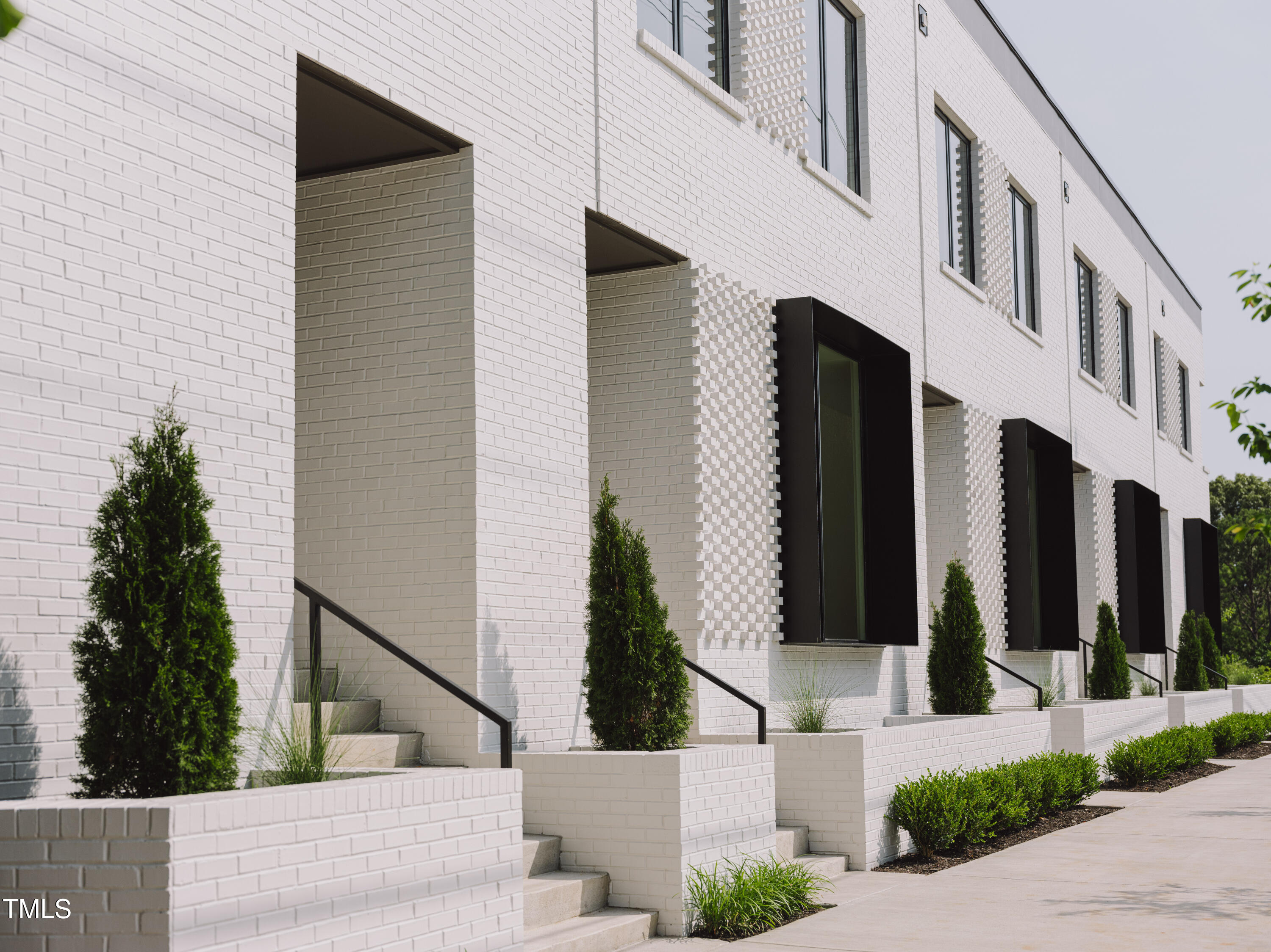 1303 Chamblee Hill Raleigh, NC 27608 - Photo 6 of 49 front view of a house with a street