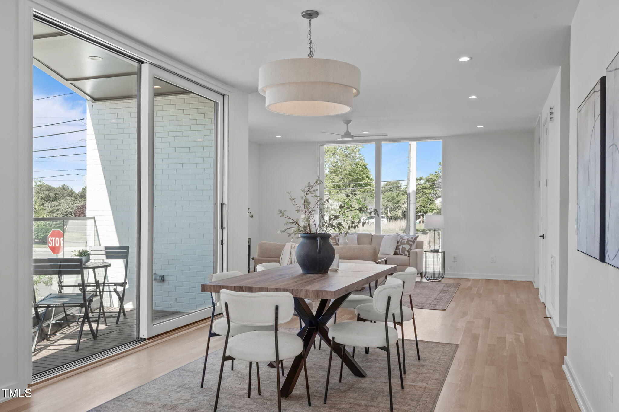 1303 Chamblee Hill Raleigh, NC 27608 - Photo 10 of 49 a dining room with furniture and window