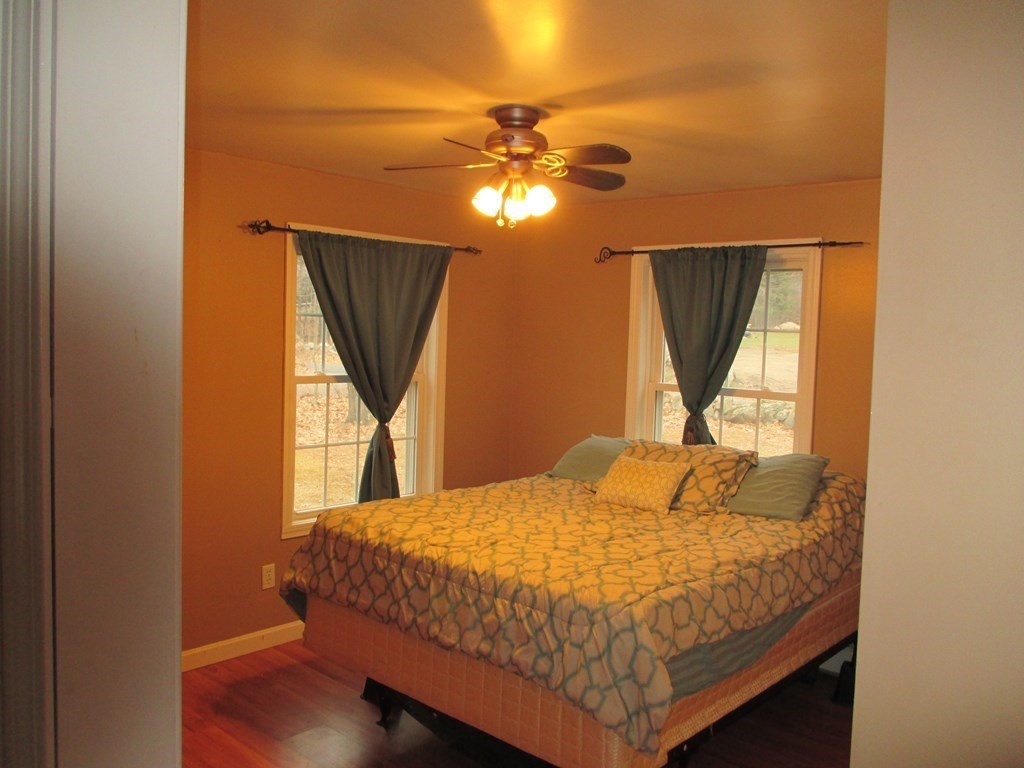 35 School House Road Phillipston, MA 01331 - Photo 13 of 32 a bedroom with a bed and a window