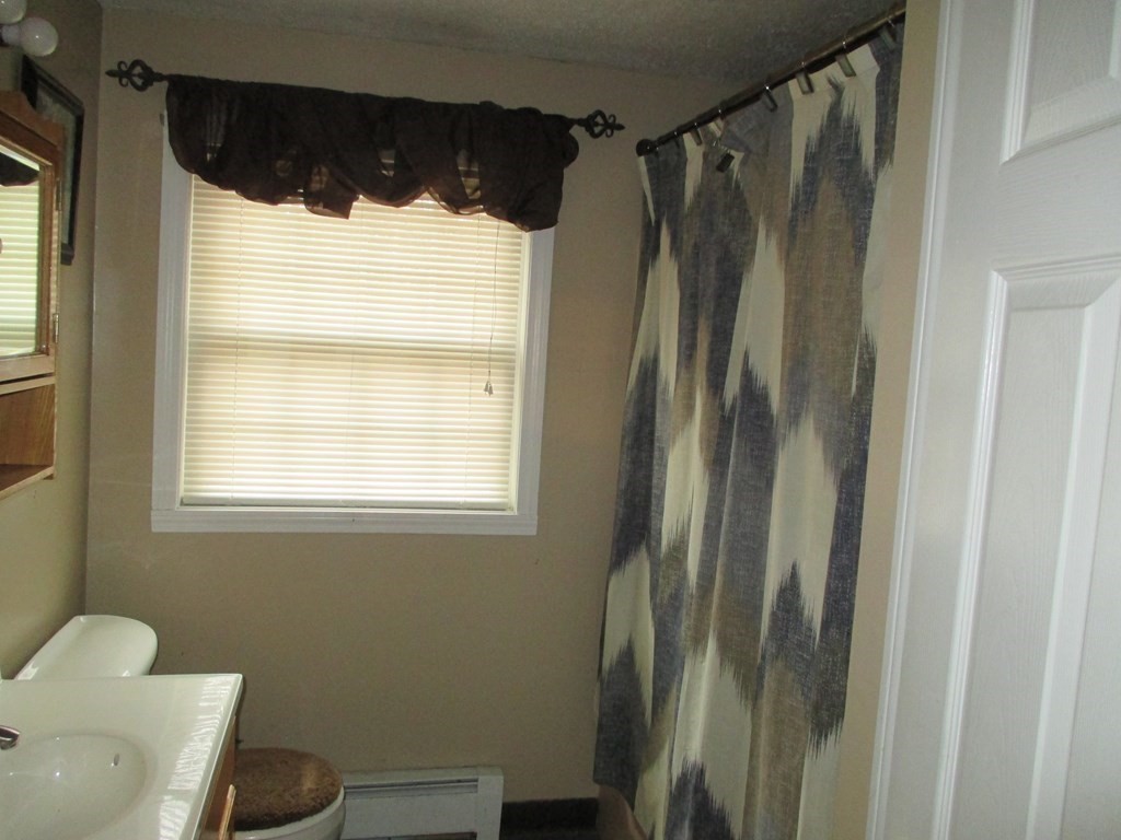 35 School House Road Phillipston, MA 01331 - Photo 19 of 32 a bathroom with a shower and a toilet