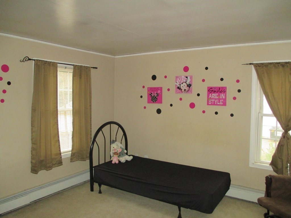 35 School House Road Phillipston, MA 01331 - Photo 20 of 32 a living room with baby crib furniture and a window