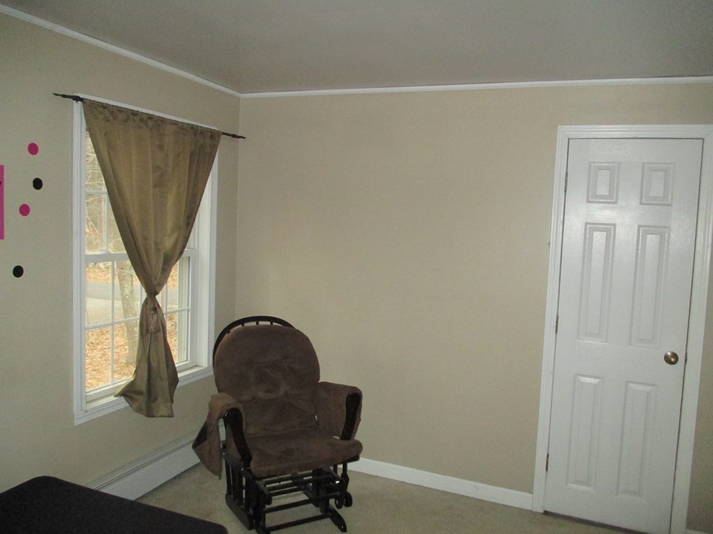 35 School House Road Phillipston, MA 01331 - Photo 21 of 32 a view of a closet area with furniture and a window
