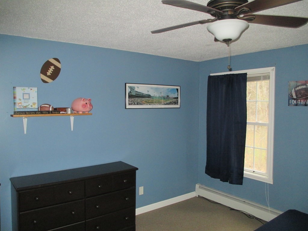 35 School House Road Phillipston, MA 01331 - Photo 25 of 32 a room with a window and a chandelier