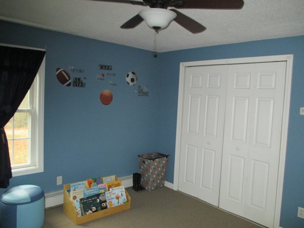 35 School House Road Phillipston, MA 01331 - Photo 26 of 32 a room with toys and wooden floor
