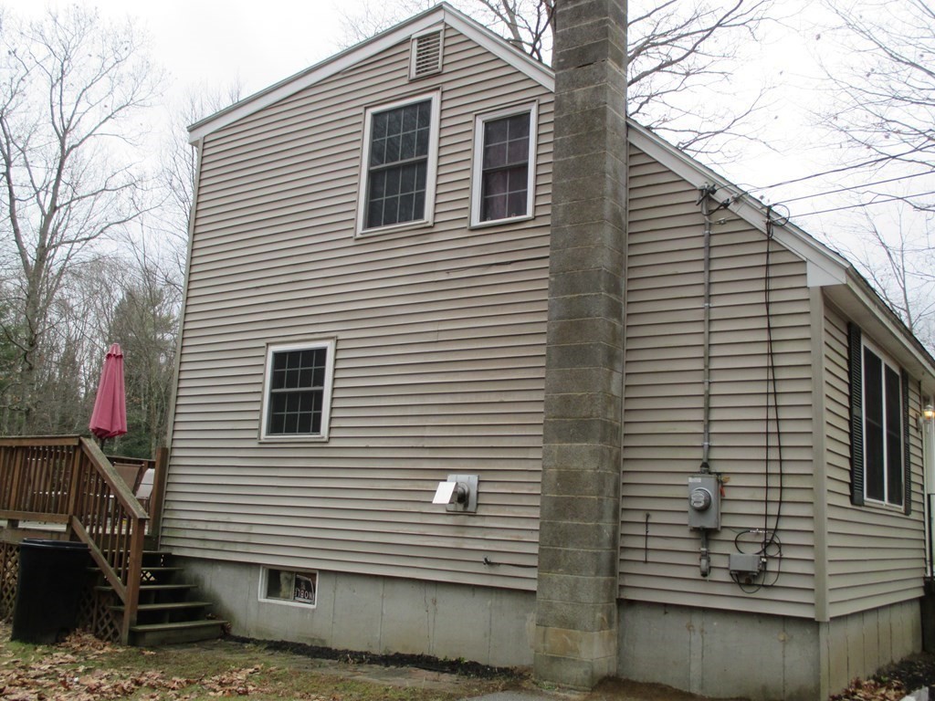35 School House Road Phillipston, MA 01331 - Photo 29 of 32 a view of a house with a yard and garage