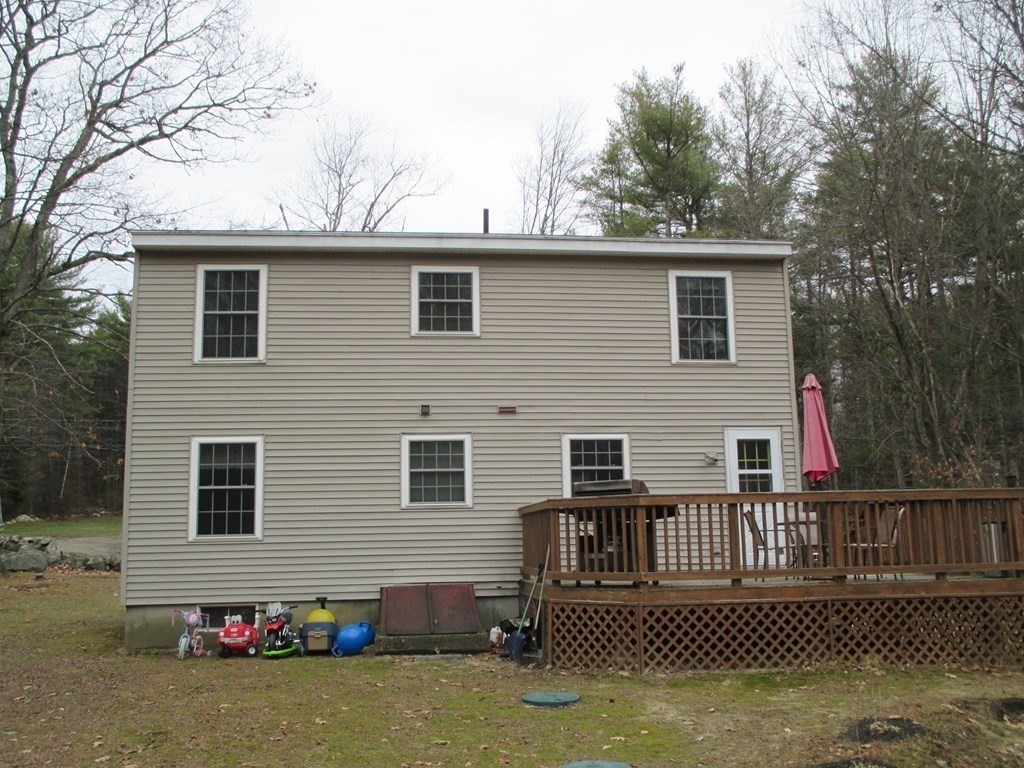 35 School House Road Phillipston, MA 01331 - Photo 30 of 32 a view of a house with a wooden fence