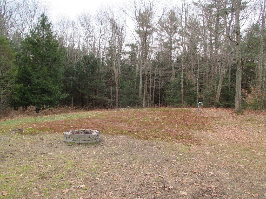35 School House Road Phillipston, MA 01331 - Photo 32 of 32 a backyard of a house with lots of green space