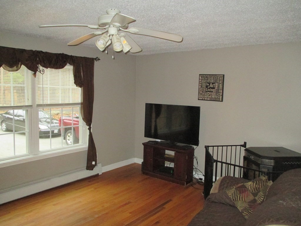 35 School House Road Phillipston, MA 01331 - Photo 9 of 32 a living room with furniture and a flat screen tv