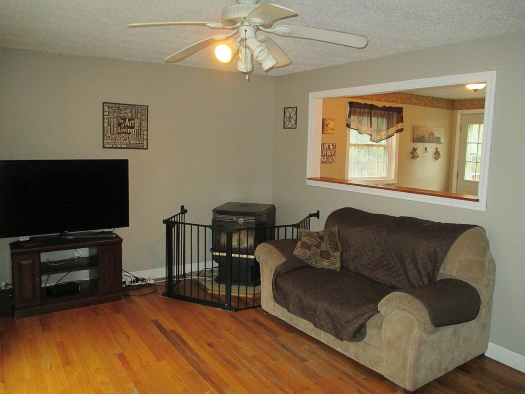 35 School House Road Phillipston, MA 01331 - Photo 10 of 32 a living room with furniture and a flat screen tv