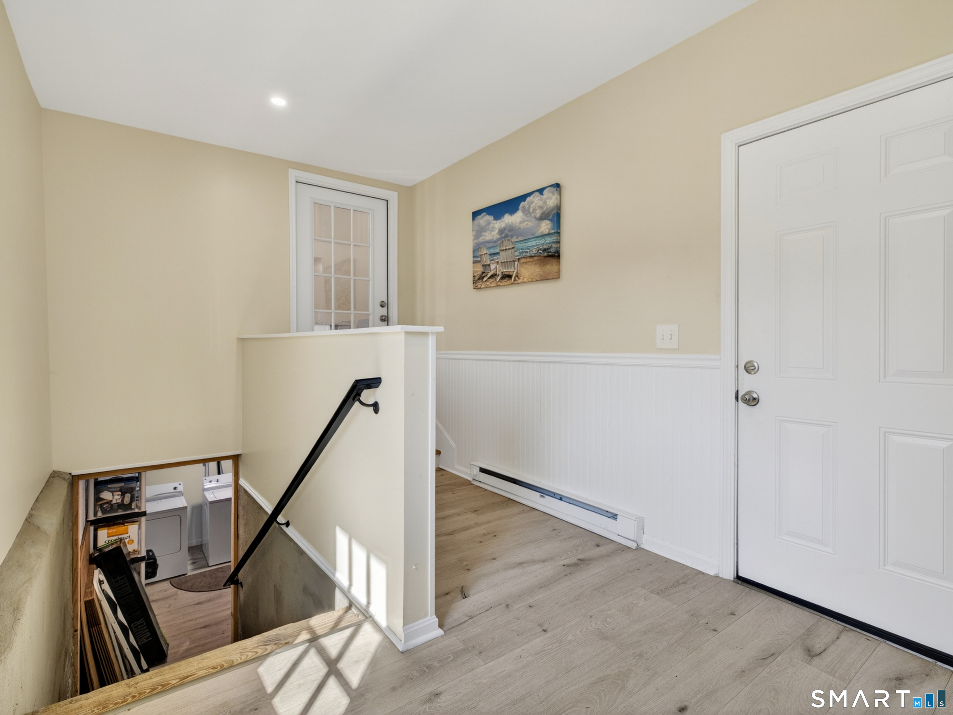 41 Sunnybrook Lane Clinton, CT 06413 - Photo 21 of 41 Mud Room leading to Lower Level Laundry