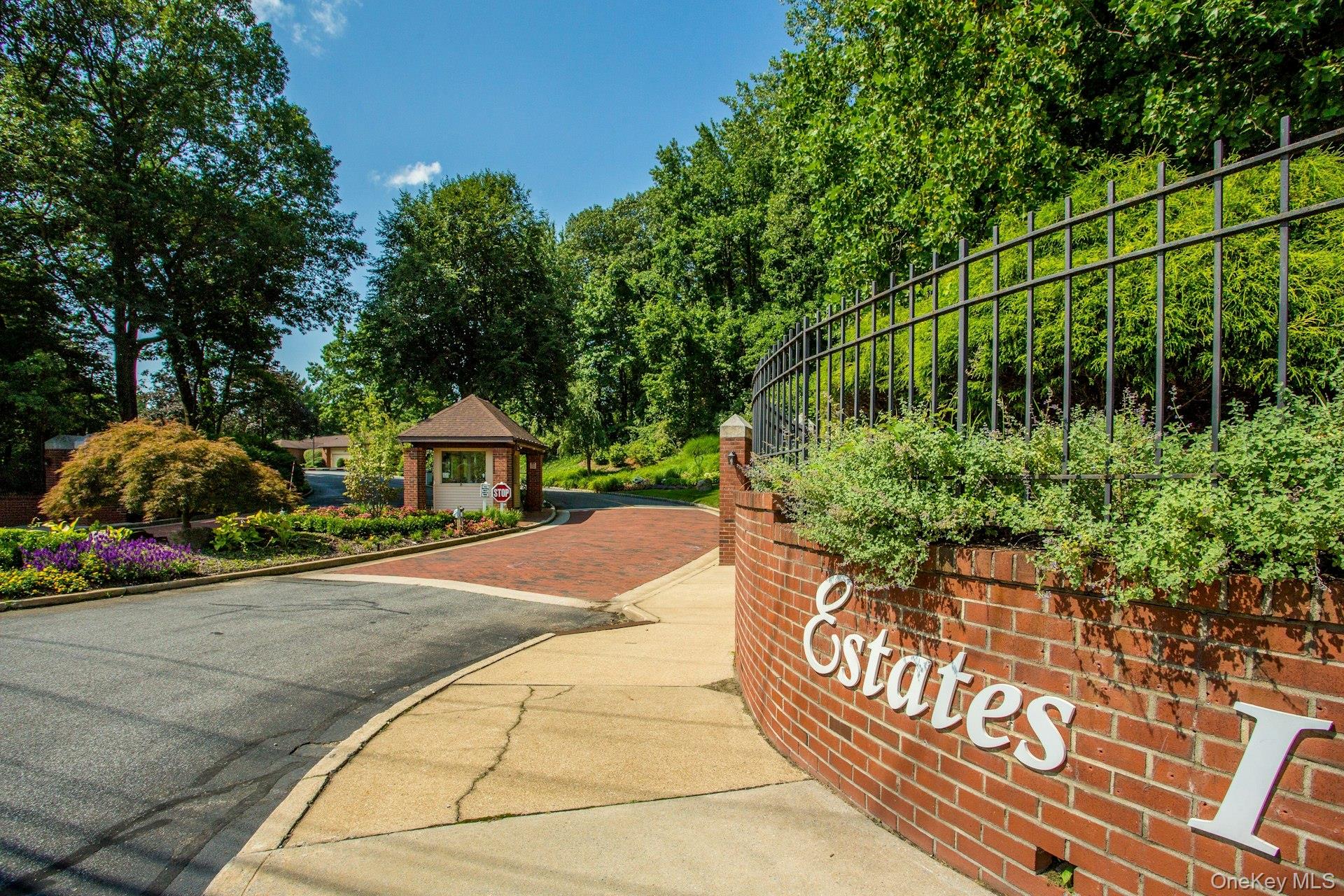 232 Linnet Court Manhasset, NY 11030 - Photo 1 of 28 a sign board with yard in the back