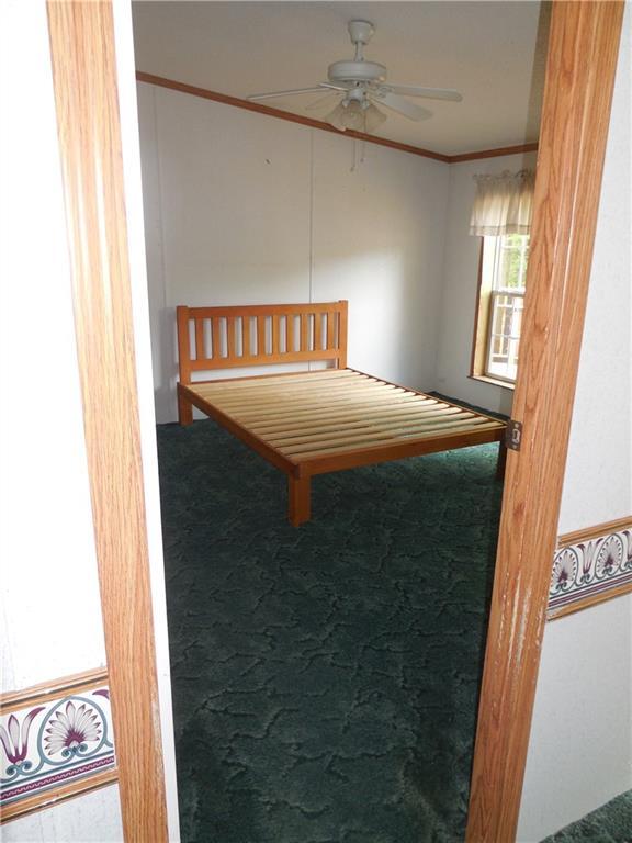 211 Brett Hill Road South Paris, ME 04281 - Photo 6 of 35 Master Bedroom off of living room.
