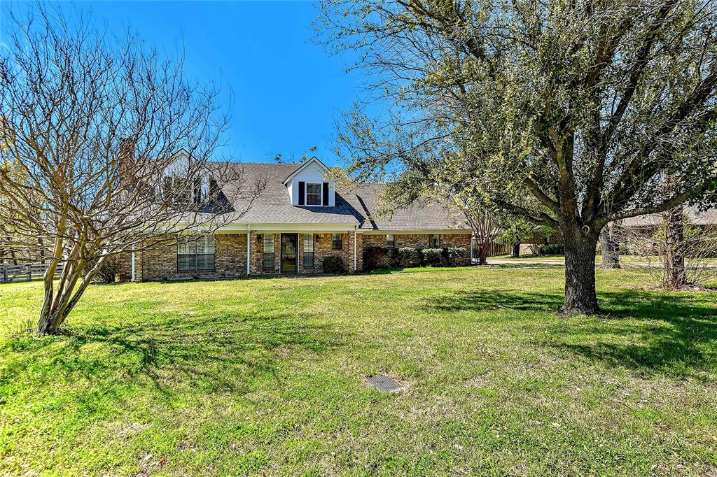 2202 Carriage Estates Road Sherman, TX 75092 - Photo 1 of 1 a view of a house with a yard