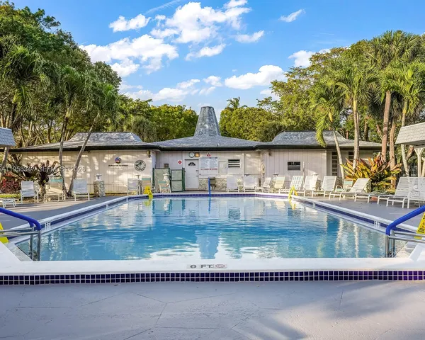 a view of a swimming pool with a patio
