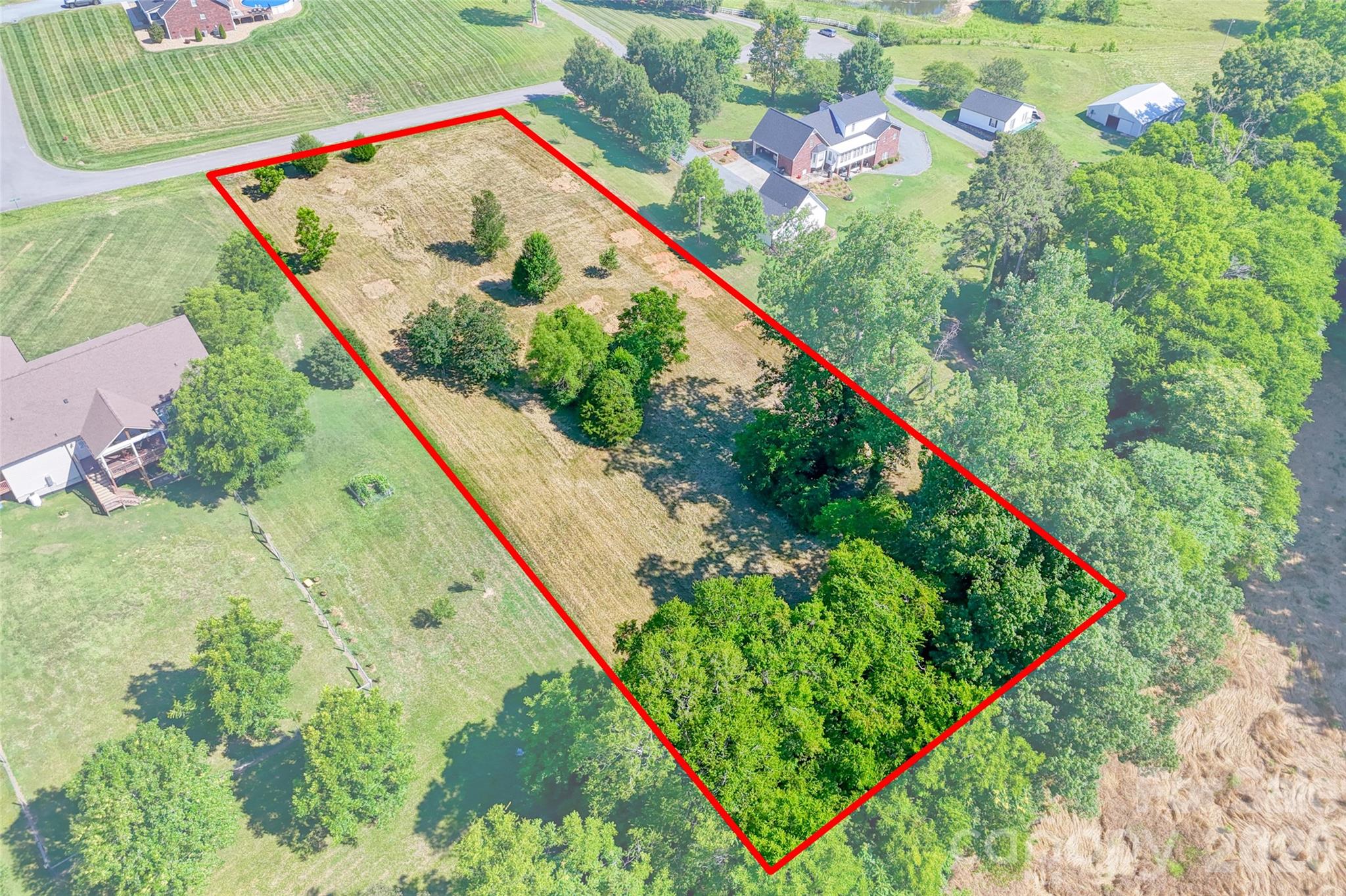 Lot 3 Crepts Branch Road, Unit 3 Locust, NC 28097 - Photo 7 of 36 a view of a garden in a balcony