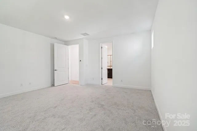 an empty room with an entryway