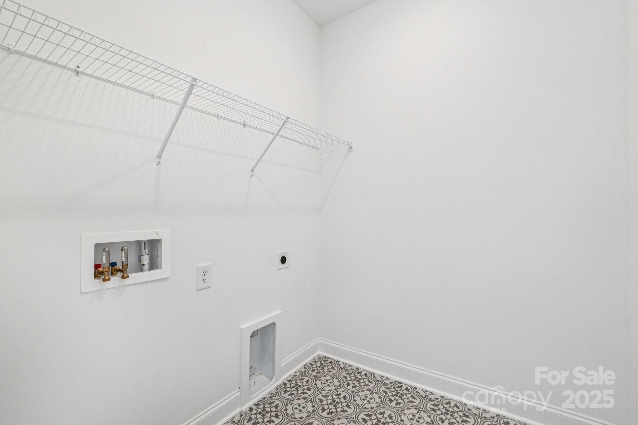 620 Mercury Drive Tega Cay, SC 29708 - Photo 13 of 16 a view of small space with empty racks on the wall