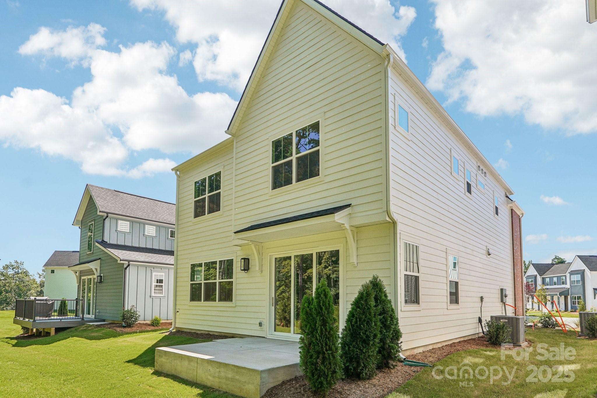620 Mercury Drive Tega Cay, SC 29708 - Photo 16 of 16 a view of a house with a swimming pool