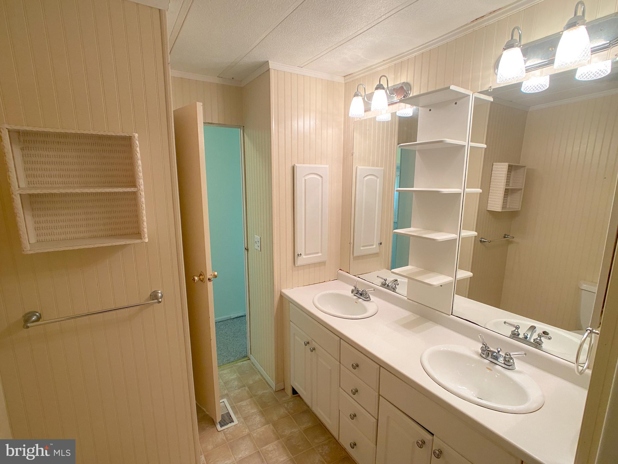 46 Jones Mill Road Wrightstown, NJ 08562 - Photo 15 of 34 a spacious bathroom with a double vanity sink mirror and double