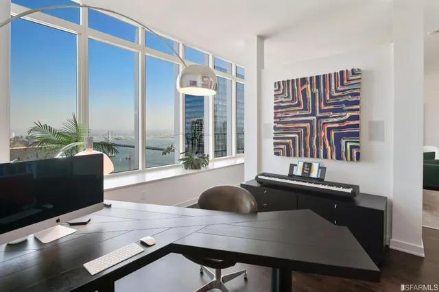 a view of a balcony and a potted plant