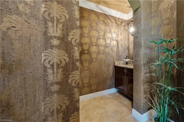 a bathroom with a shower and a sink