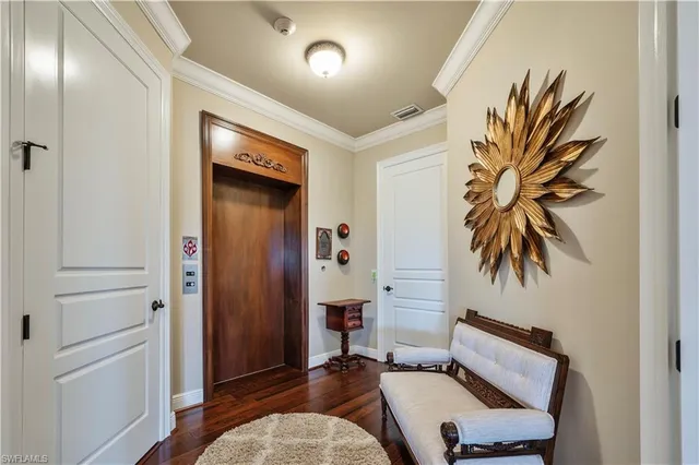 a bedroom with a bed and a hallway