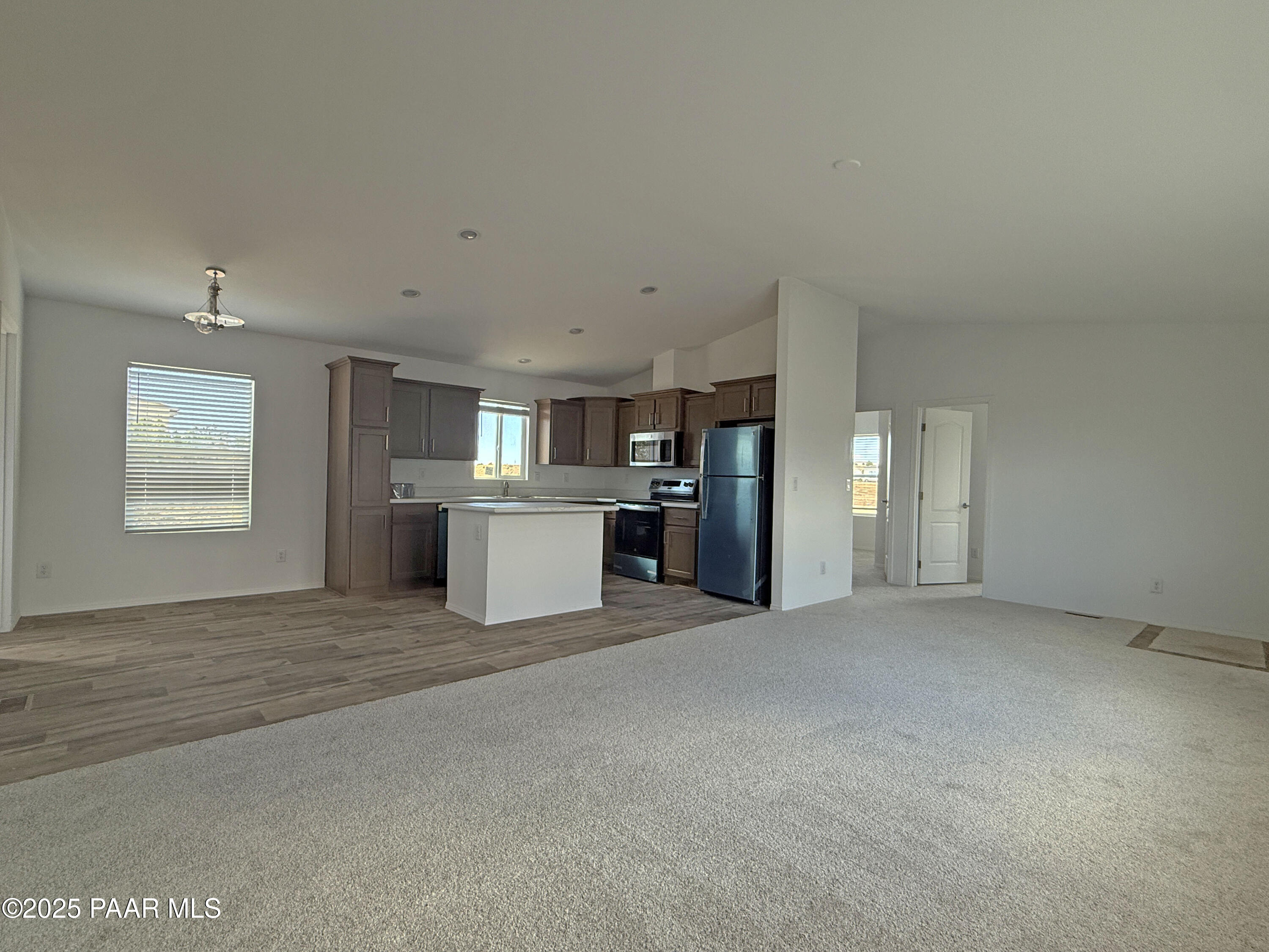 375 Antelope Run Road Paulden, AZ 86334 - Photo 14 of 17 a view of a kitchen with a sink cabinets and a window