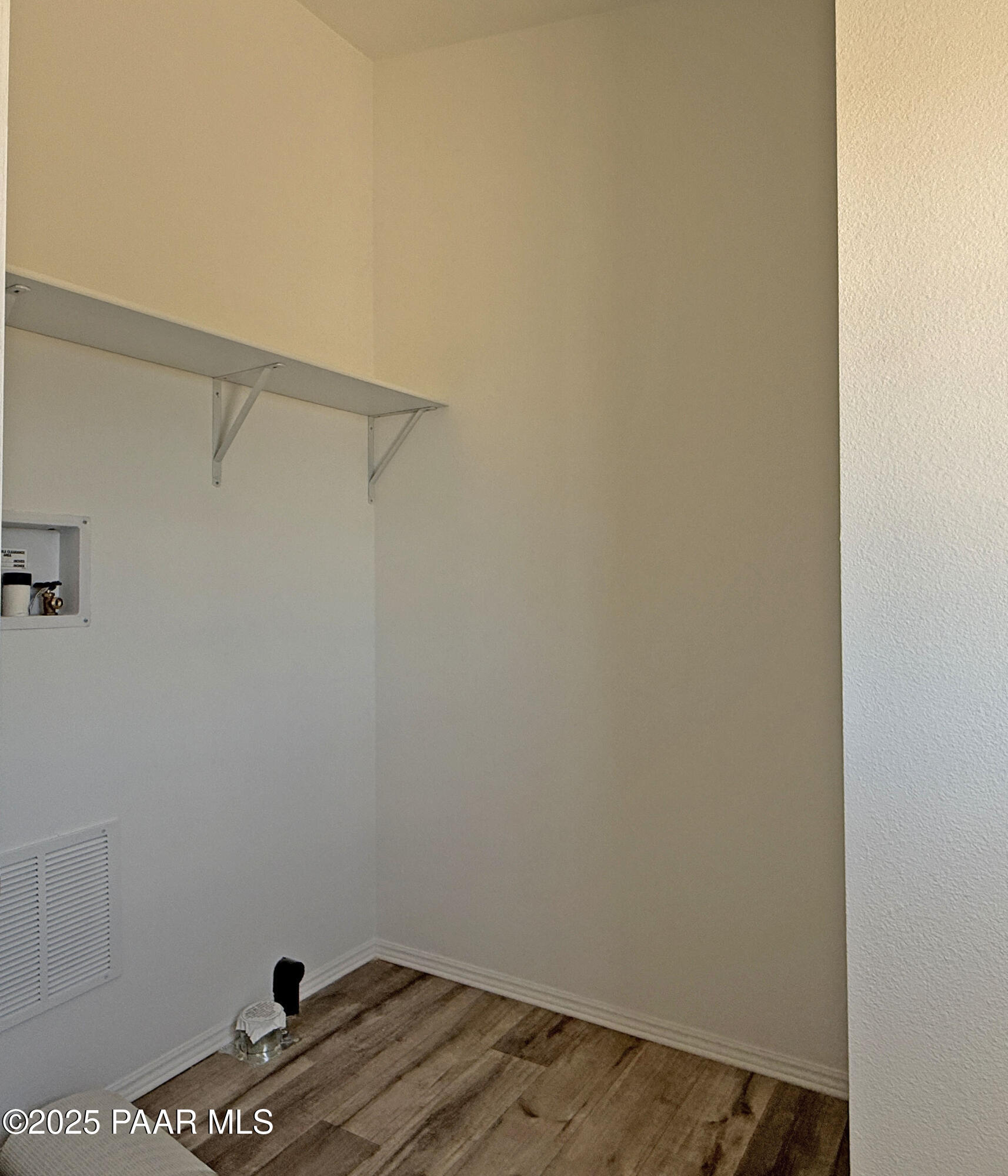 375 Antelope Run Road Paulden, AZ 86334 - Photo 17 of 17 a view of small space with empty racks on the wall