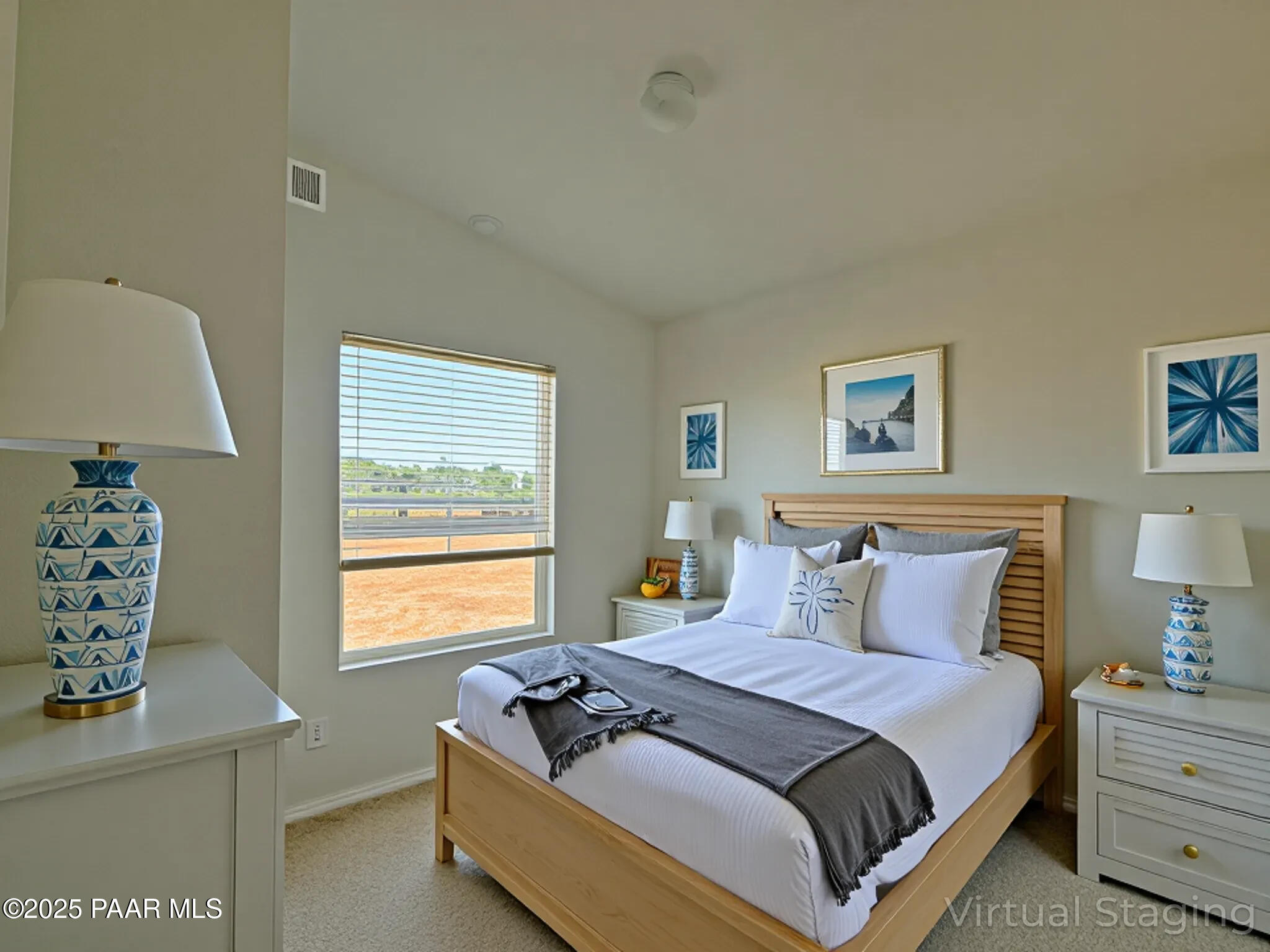 375 Antelope Run Road Paulden, AZ 86334 - Photo 3 of 17 a bedroom with a bed and a window