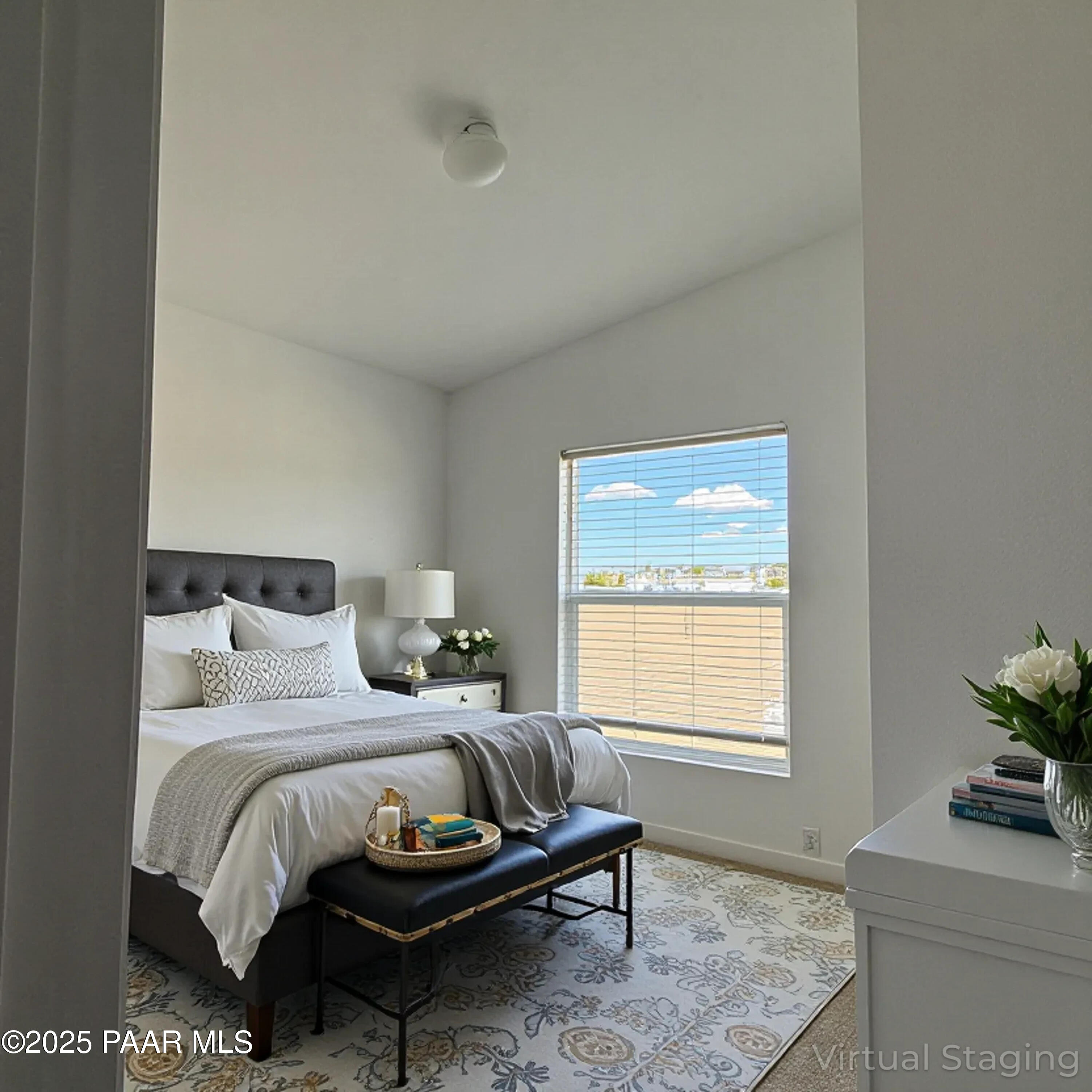 375 Antelope Run Road Paulden, AZ 86334 - Photo 5 of 17 a bedroom with a bed and window