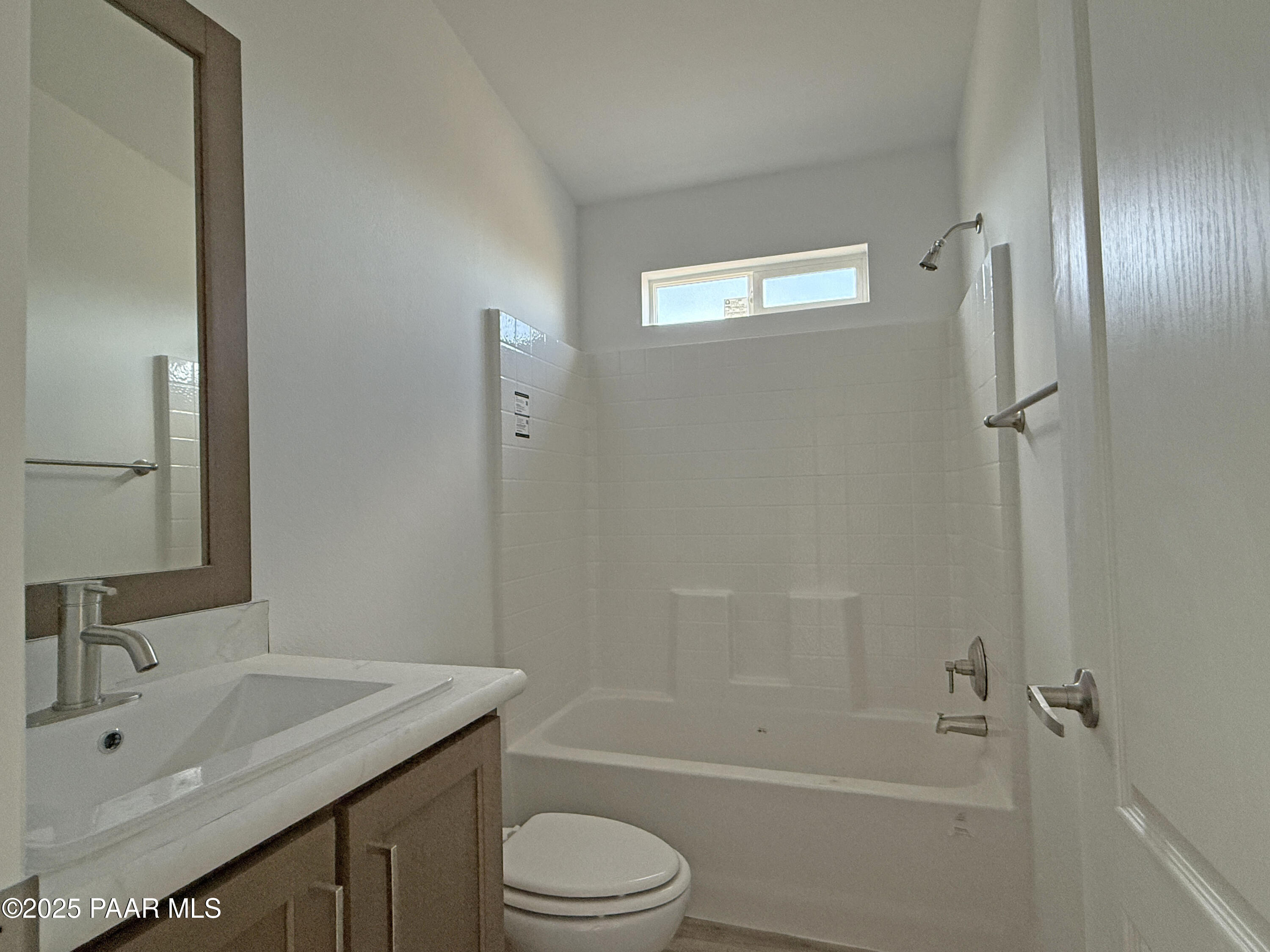 375 Antelope Run Road Paulden, AZ 86334 - Photo 8 of 17 a bathroom with a granite countertop sink toilet and shower