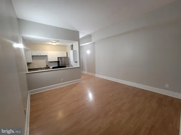 a view of a kitchen with a sink