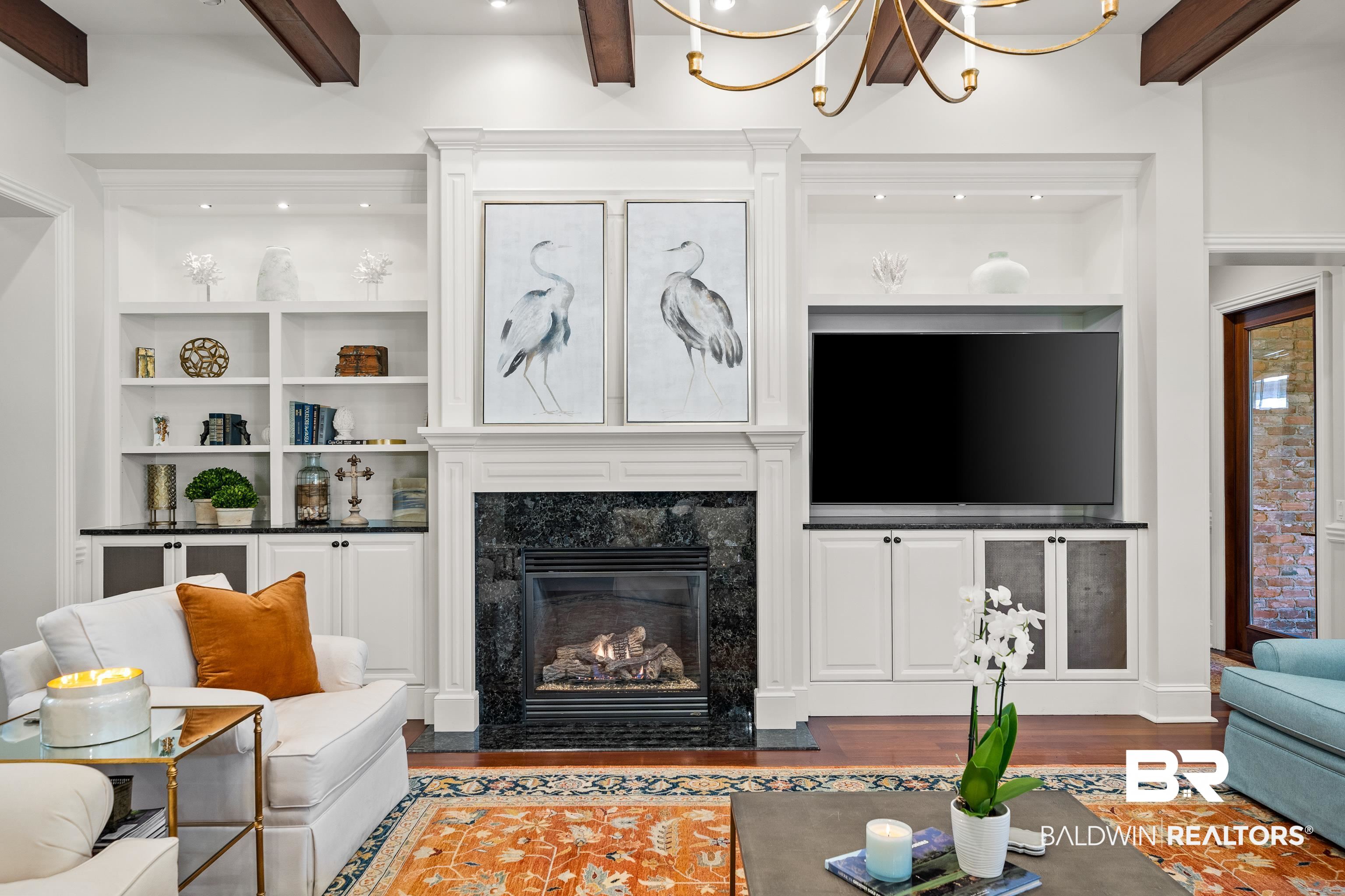3613 Old Park Road Gulf Shores, AL 36542 - Photo 11 of 72 Living area featuring built in features, a premium fireplace, beam ceiling, and wood finished floors