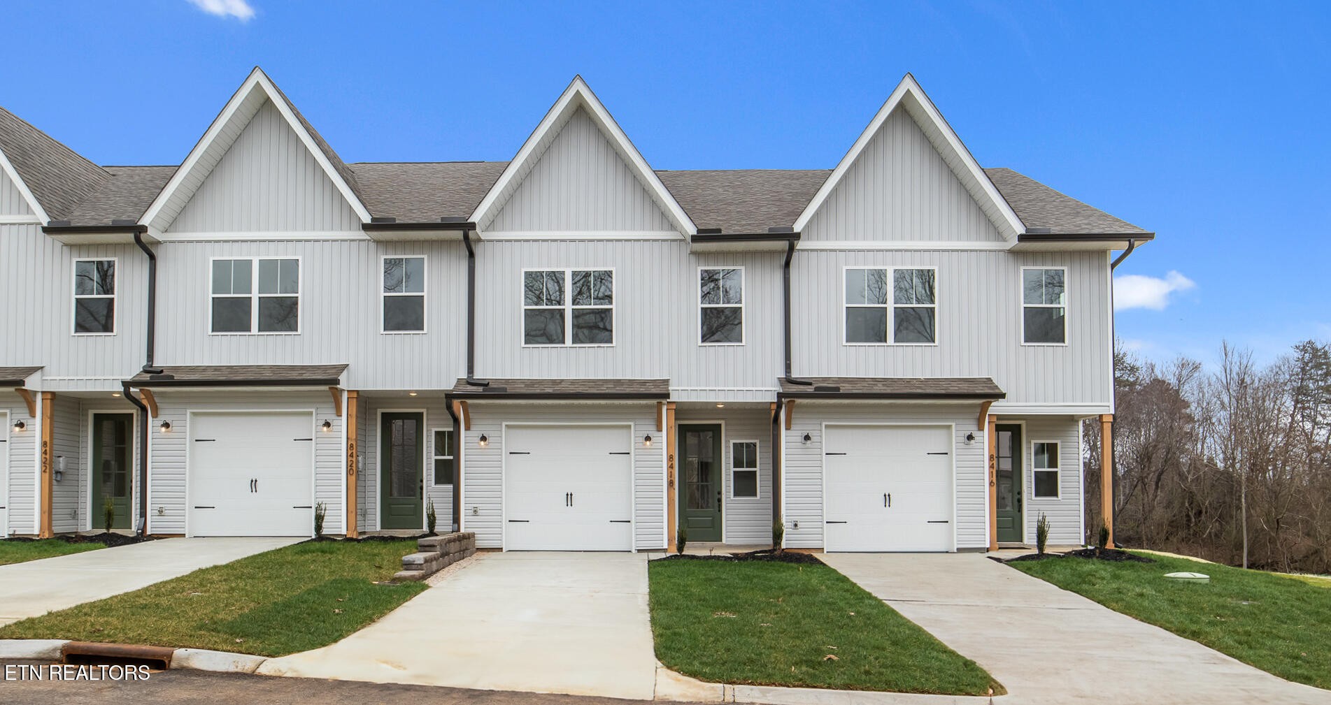 a view of house with yard