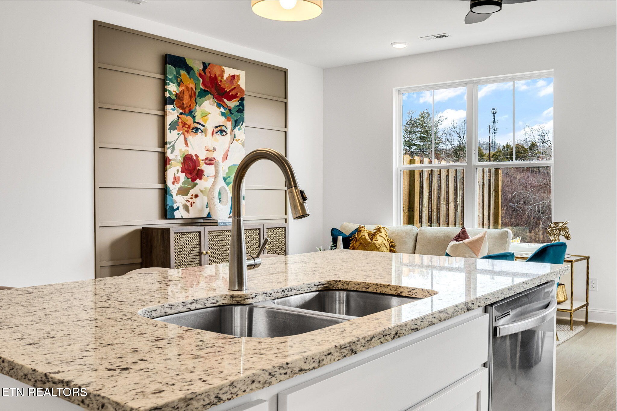 8418 Whisper Lane Powell, TN 37849 - Photo 13 of 42 a kitchen with a sink and a wooden floor