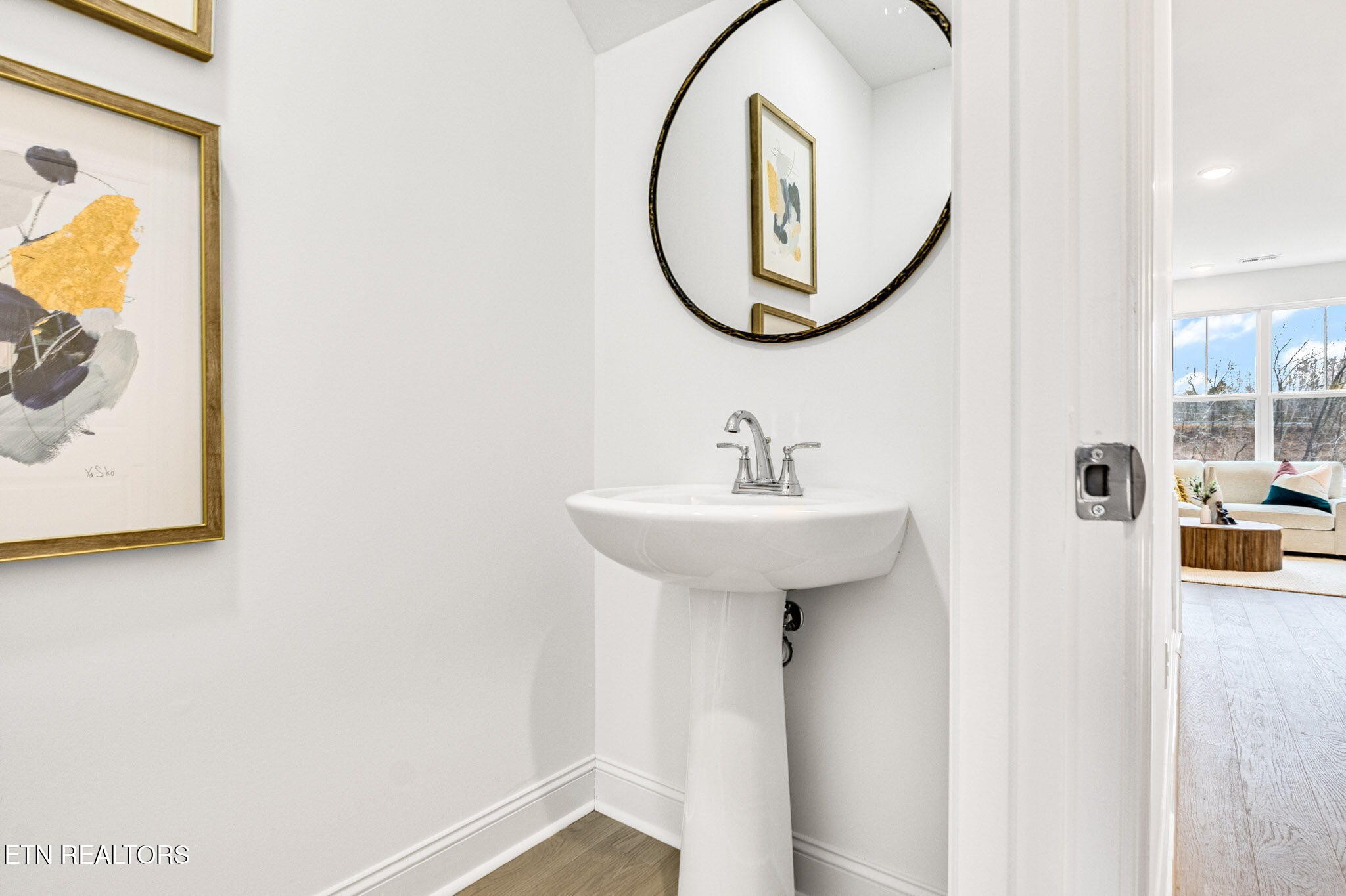 8418 Whisper Lane Powell, TN 37849 - Photo 17 of 42 a bathroom with a sink and a mirror